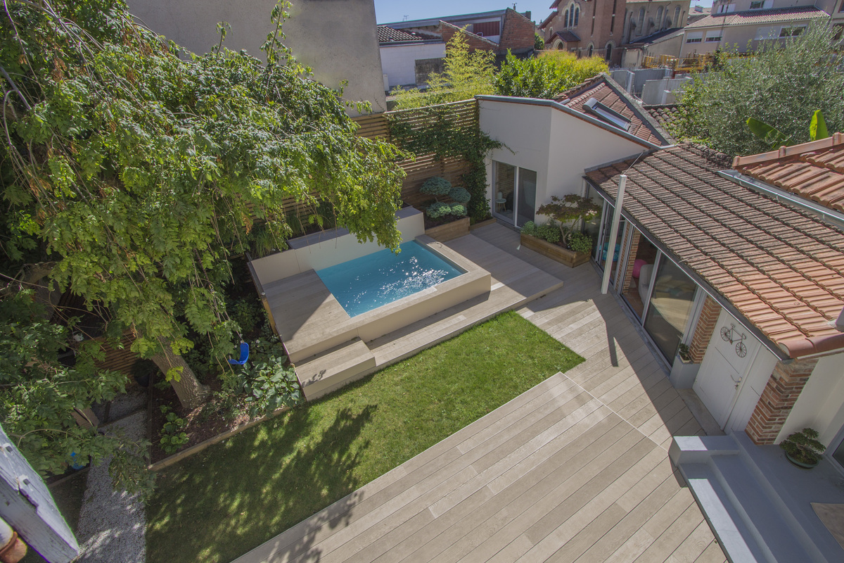 Realization of a modern garden with a Beogarden space Realization of a modern garden with a Beogarden space